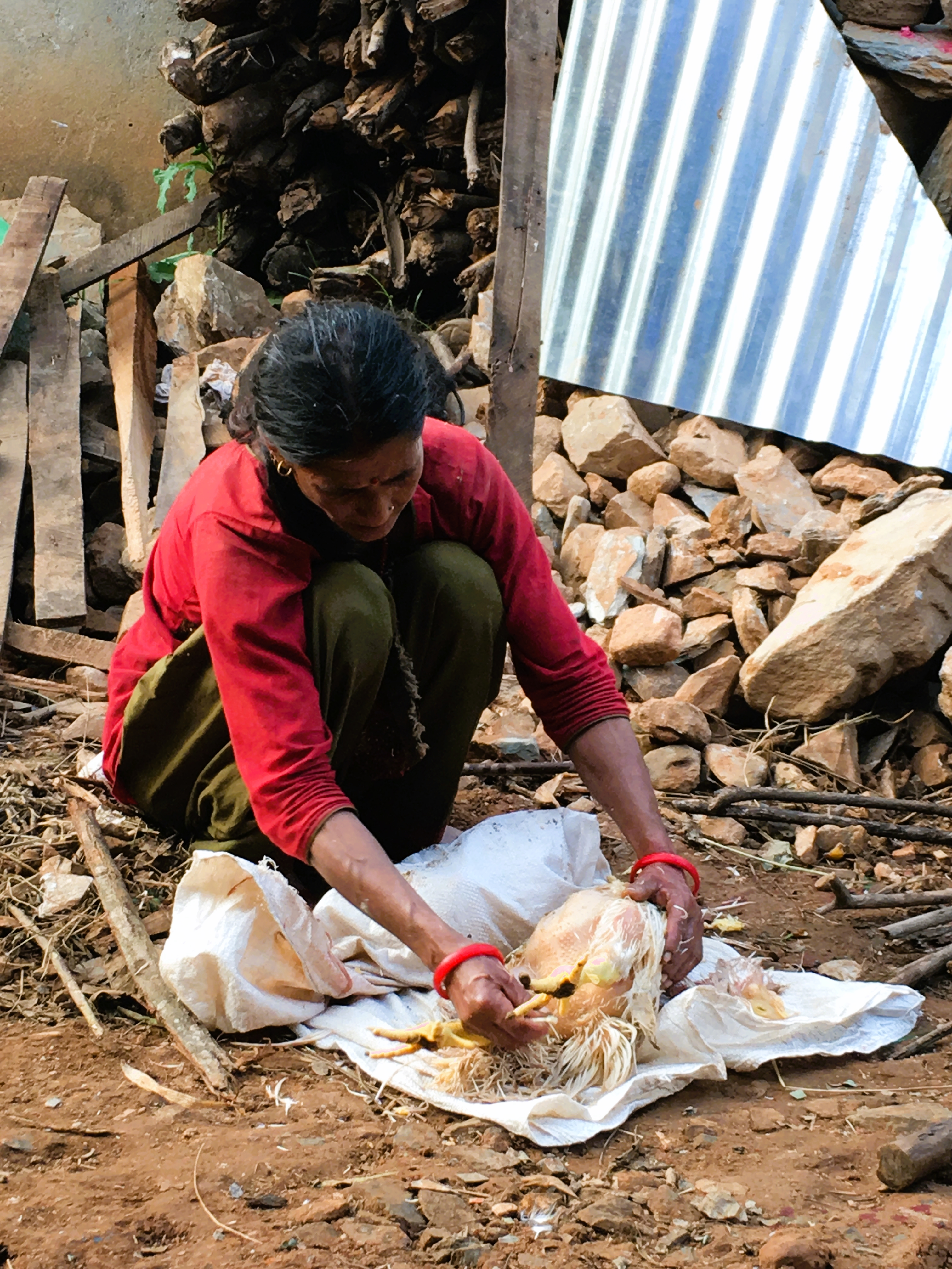 #8 Preparing chicken outdoors